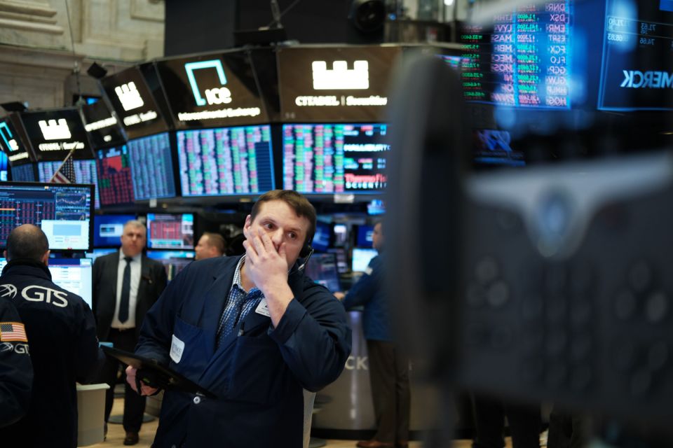 NEW YORK, NEW YORK - MARCH 18: Traders work on the floor of the New York Stock Exchange (NYSE) on March 18, 2020 in New York City. The Dow fell more than 1,200 points today as COVID-19 fears continue to roil world markets. (Photo by Spencer Platt/Getty Images)
